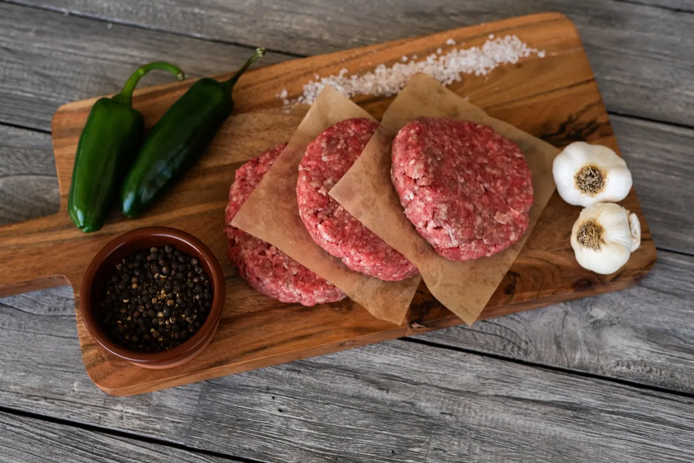 Half Beef reservation: 80/20 ground beef from Bourbon Beef on a cutting board